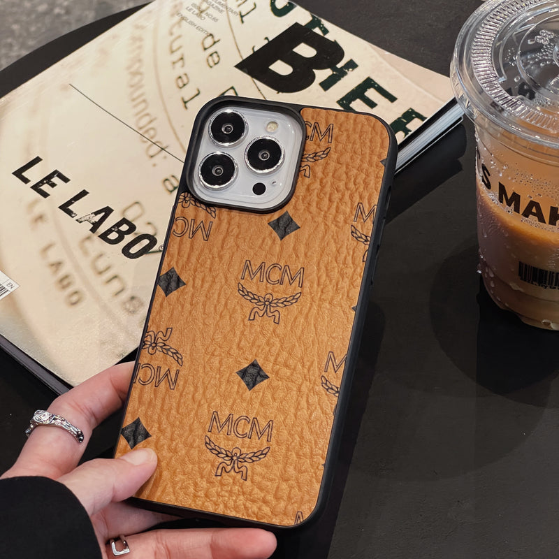 Pouzdro MCM iPhone žluté-MCK240603