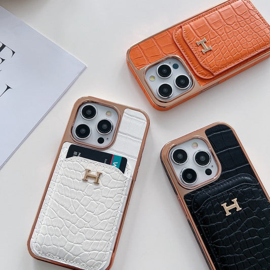 Capa para iPhone em couro dourado rosa H